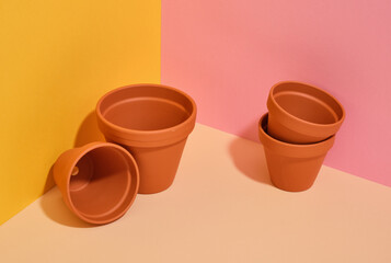 Empty clay pots for growing flowers. Spring gardening.