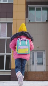 School, child kid girl daughter goes school with backpack white snow winter, girl hurry study class, little schoolgirl with bag walking through park school building, happy chilt school backpack hurry