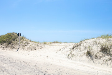 vivid white dunes on blue sky day, minimalist photography