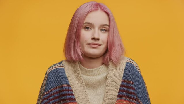 Pensive Woman with Pink Hair Shrugging Shoulders