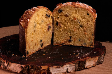 Panettone cake is a traditional Italian Easter and Christmas dessert. Sliced panettone, tender...