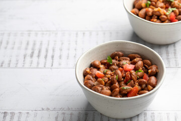  Vegetarian dish of stewed pink beans and tomatoes. A delicious bean dish served 