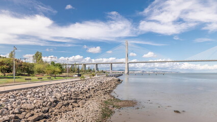 Panorama showing the Vasco da Gama Bridge timelapse in Lisbon, Portugal
