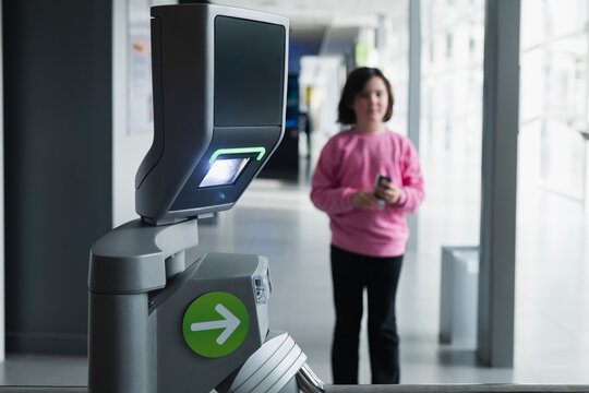 Modern ticket validation at museum with young visitors