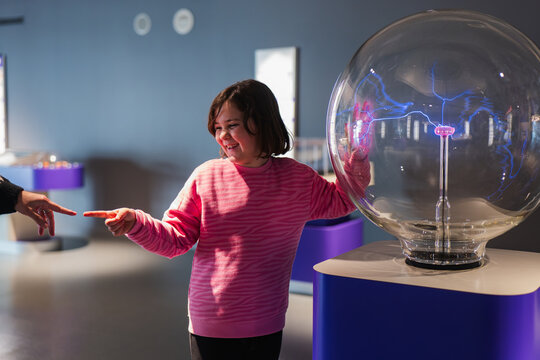 Children exploring interactive exhibits at a science museum