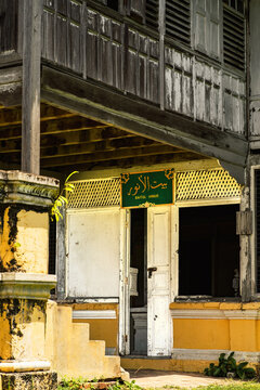 Perak, Malaysia - Oct 18, 2022 Old weathered wooden house built in 1912 in Kuala Kangsar named Baitul Annur.
