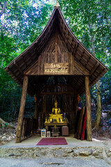 Buddha statue in the middle of a valley in a place in Thailand