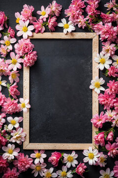 Floral frame with chalkboard and handwritten text "syraps. Generative AI image