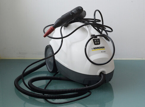 BRUGES, BELGIUM – FEBRUARY 22, 2024: Black and white compact Kärcher steam cleaner, model SC 3.000 Kärcher is a German company producing high quality cleaning solutions since 1935