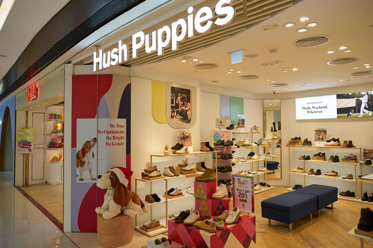 HONG KONG, CHINA - DECEMBER 04, 2023: a Hush Puppies store in New Town Plaza shopping mall. Hush Puppies is an American brand of casual footwear.