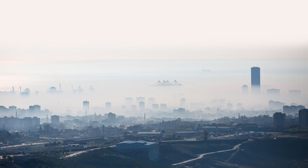 Cityscape of Mersin Downtown skyline on a foggy winter day - Aerial view of buildings and mersin...