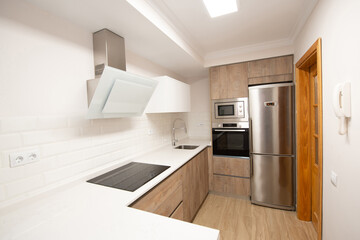 modern kitchen in a home equipped with appliances and decoration