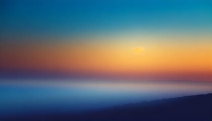 Obraz premium Abstract misty blurry landscape background image with sunrise gradient hues, blue and orange tones over the clouds