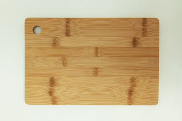 Wooden kitchen cutting board.White background.