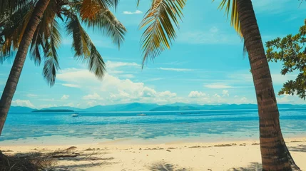 Crédence de cuisine en verre imprimé Turquoise A paradise tropical beach with blue sea, white sand and palm trees