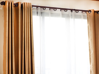 Curtains window gold color decoration interior of room. Home decoration ideas.