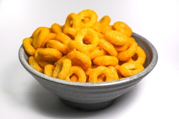 Snack on cheese flavored rings in a bowl