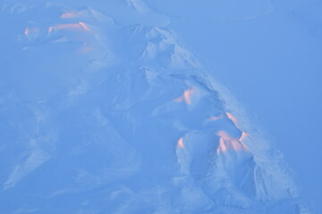 View of Greenland from Jet Plain Window in Winter Nature cold ice Mountains