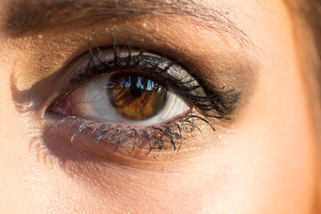 a close up of a woman s eye with makeup on