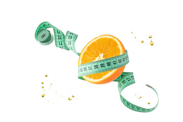 Orange fruit slice and measuring tape flying isolated on white background. Symbol of healthy dieting and control weight.