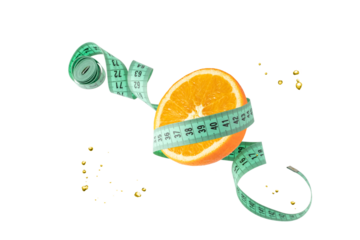 Orange fruit slice and measuring tape flying isolated on white background. Symbol of healthy dieting and control weight.