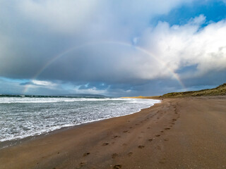 Beautiful rainbow at Portnoo Narin beach in County Donegal - Ireland