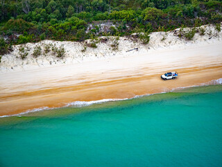 4x4 driving on beach, Moreton Island, QLD, Australia