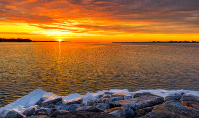 Sunset in winter over Amherst Island, on lake Ontario, Canada	 - 747257078