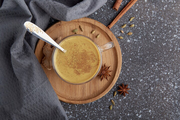 Indian masala traditional tea. Masala chai tea with milk and spices. Hygge autumn home aesthetic