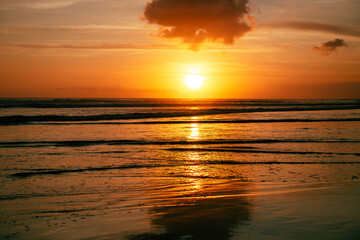 Golden sunset on the beach in Bali