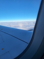 Fototapeta na wymiar Halo view from airplane window