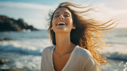 Capture a beautiful portrait of a young woman at the beach with arms wide open, relishing in free time and the liberating feeling of freedom outdoors. 