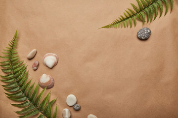Earthy eco friendly summer vibes on a craft paper backdrop with eco-friendly elements