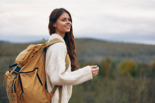 Stylish Woman Climbing Mountain - Adventure, Smiling, Backpack, Outdoor, Cliff