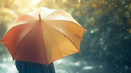 Fototapeten Rear view of woman holding yellow umbrella, rainy day © jirayut
