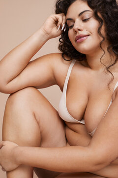 Studio shot of young woman wearing lingerie