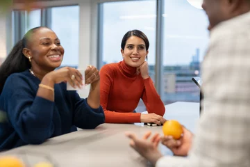 Papier Peint photo autocollant Dans la rue Office workers spending time together in canteen