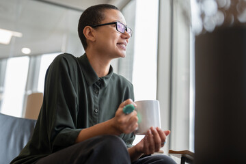 Woman resting in office lobby