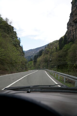 Beautiful forest road in the mountains in Turkey view from the car 