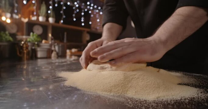 Process of the Neapolitan pizza making in the pizzeria