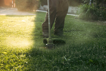 Lawn mover on green grass. Machine for cutting lawns.