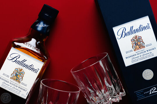 Ballantine's blended scotch whisky with two glasses of whisky. Illustrative editorial