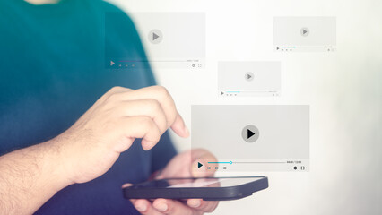 Hand of man touching the screen, listening to playlist media on smartphones, technology people. Video streaming on the Internet. Live video content online streaming marketing concept.