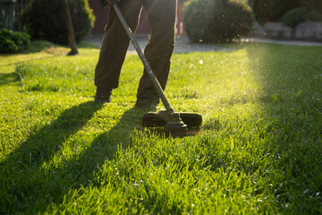 Lawn mover on green grass. Machine for cutting lawns.