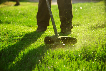 Lawn mover on green grass. Machine for cutting lawns.