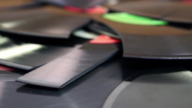 Many broken old vinyl disks RPM 33 and 78