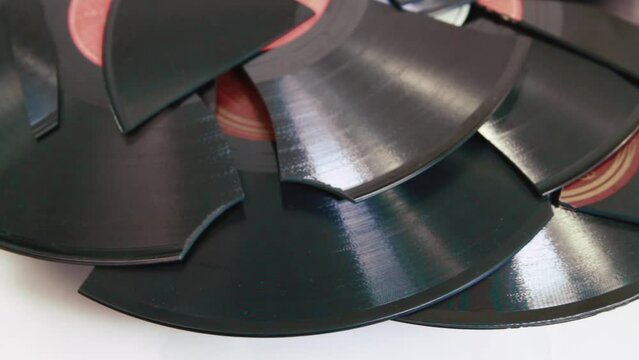 Many broken vintage vinyl discs