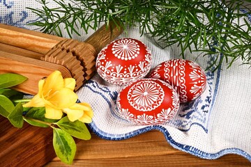 Easter - cheerful colorful Easter eggs - Czech tradition of decorating with wax,
still life with...