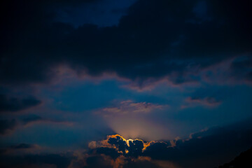 Moonlight in Cloudscape at Night in Lugano, Ticino, Switzerland.