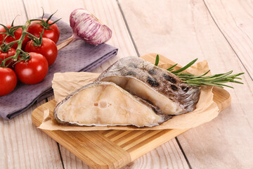 Raw wolffish steak for cooking